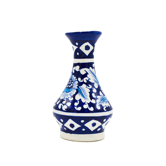 Decorative blue and white ceramic flower vase on a white background